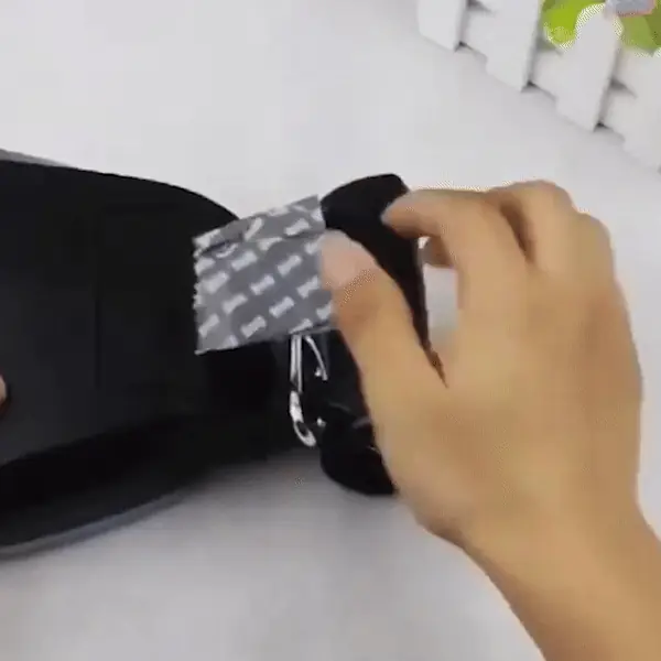 Animated demonstration showing how to use the Dog Pooper Picker with a bag for pickup