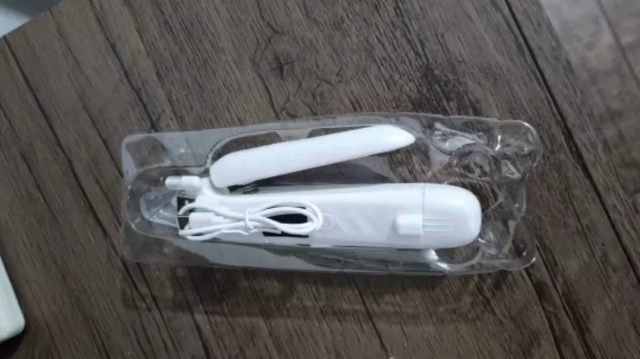 Customer photo of a small dog after using the LED Dog Nail Trimmer