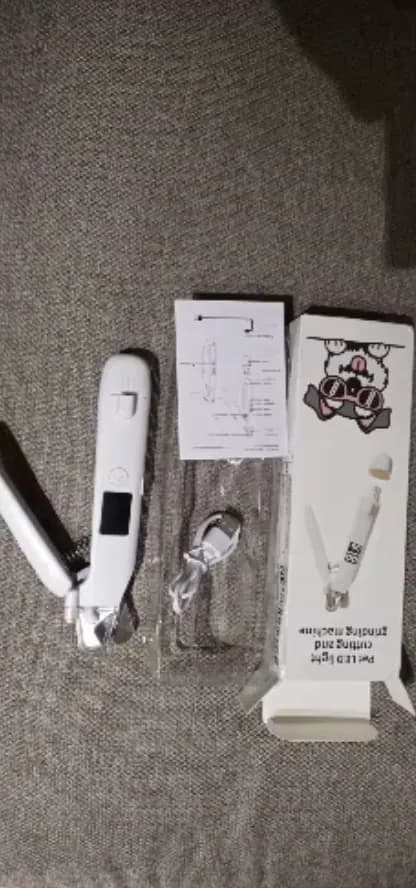 Customer side-view photo of the LED Dog Nail Trimmer body