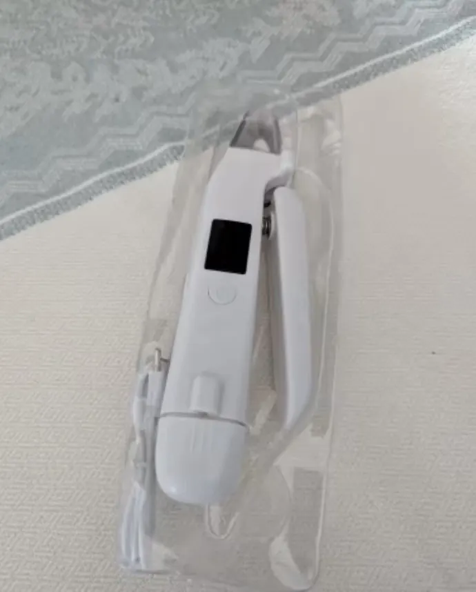 Customer photo of the LED Dog Nail Trimmer instruction sheet and packaging